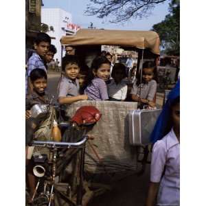 Schoolchildren in Cycle Rickshaw, Aleppey, Kerala State, India Premium 