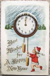 VINTAGE EMBOSSED BEST WISHES HAPPY NEW YEAR POSTCARD with CUPID and 