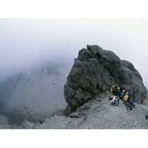 com Team of Geologists Shelter From High Winds on Bezymianny Volcano 