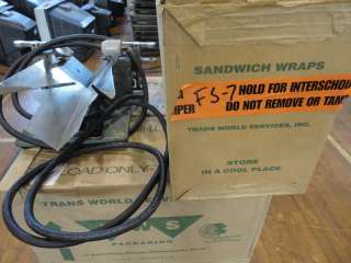 Sandwich Packaging Machine & 7 boxes of Plastic Wraps  