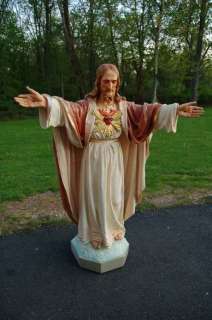 Older statue Christ The Sacred Heart + + chalice +  