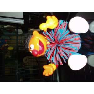  Toy. Bert. Tiny Rubber Duck in Left Hand. Blue and Red Fuzzy Rubbery 