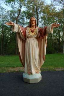 Older statue Christ The Sacred Heart + + chalice +  