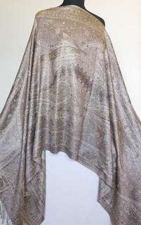 This is an elegant, light weight shawl with a jacquard woven, jamavar 