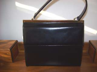   in CANADA for  NEW YORK black leather Kelly style purse  